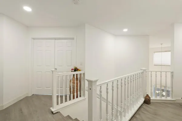 a view of a hallway with entryway