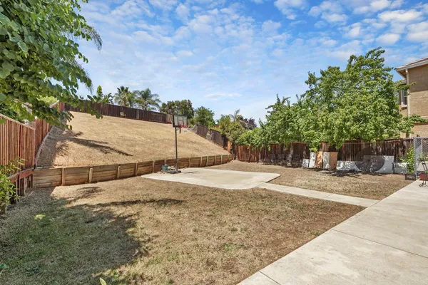 an ocean view with wooden fence