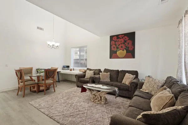 a living room with furniture and a couch