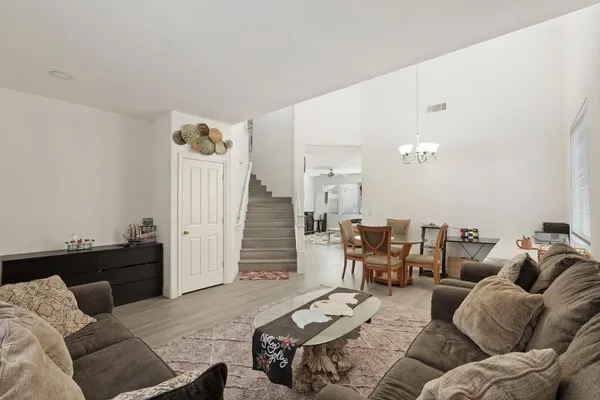 a living room with furniture and a couch