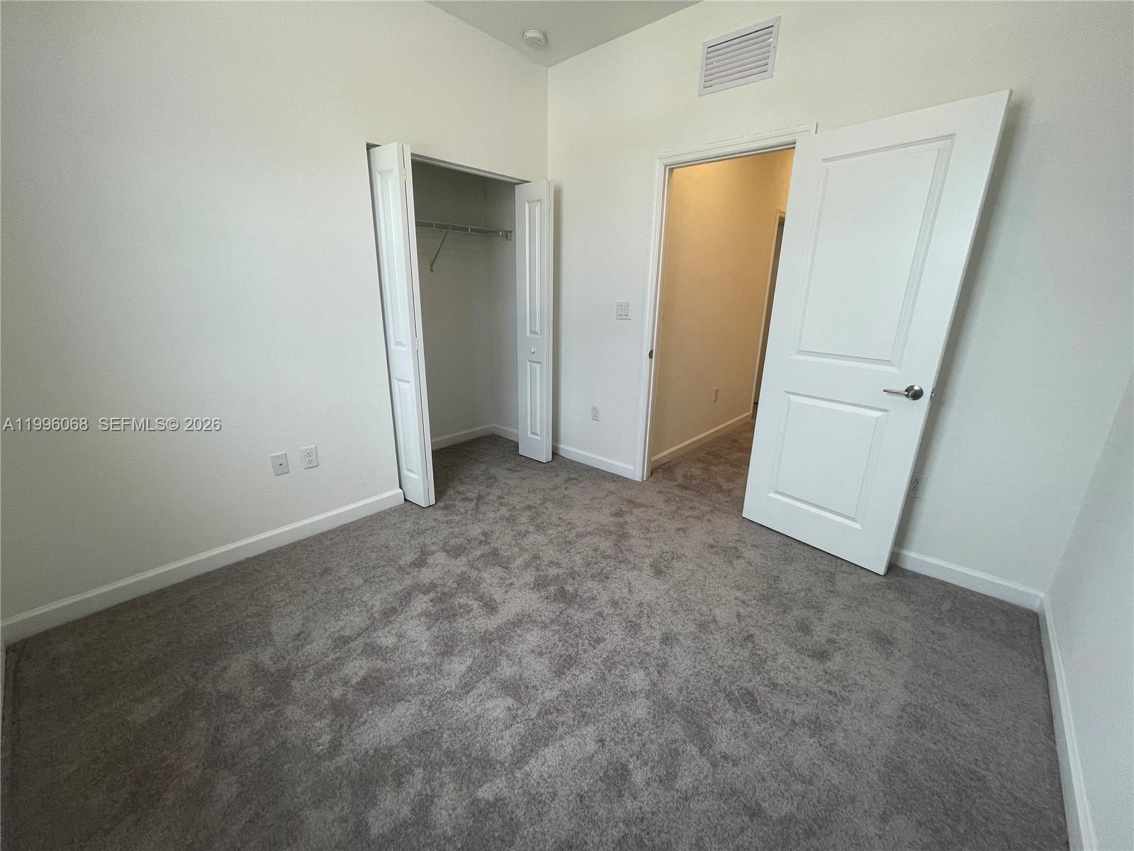 13262 Southwest 287th Terrace Homestead, FL 33033 - Photo 11 of 33 an empty room with windows