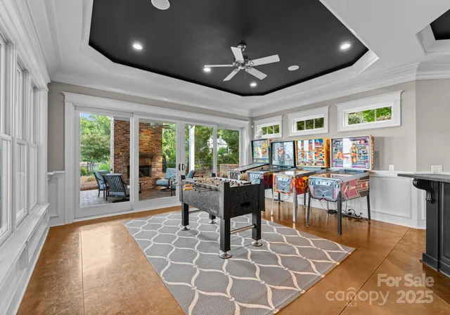 a terrace with outdoor seating and city view