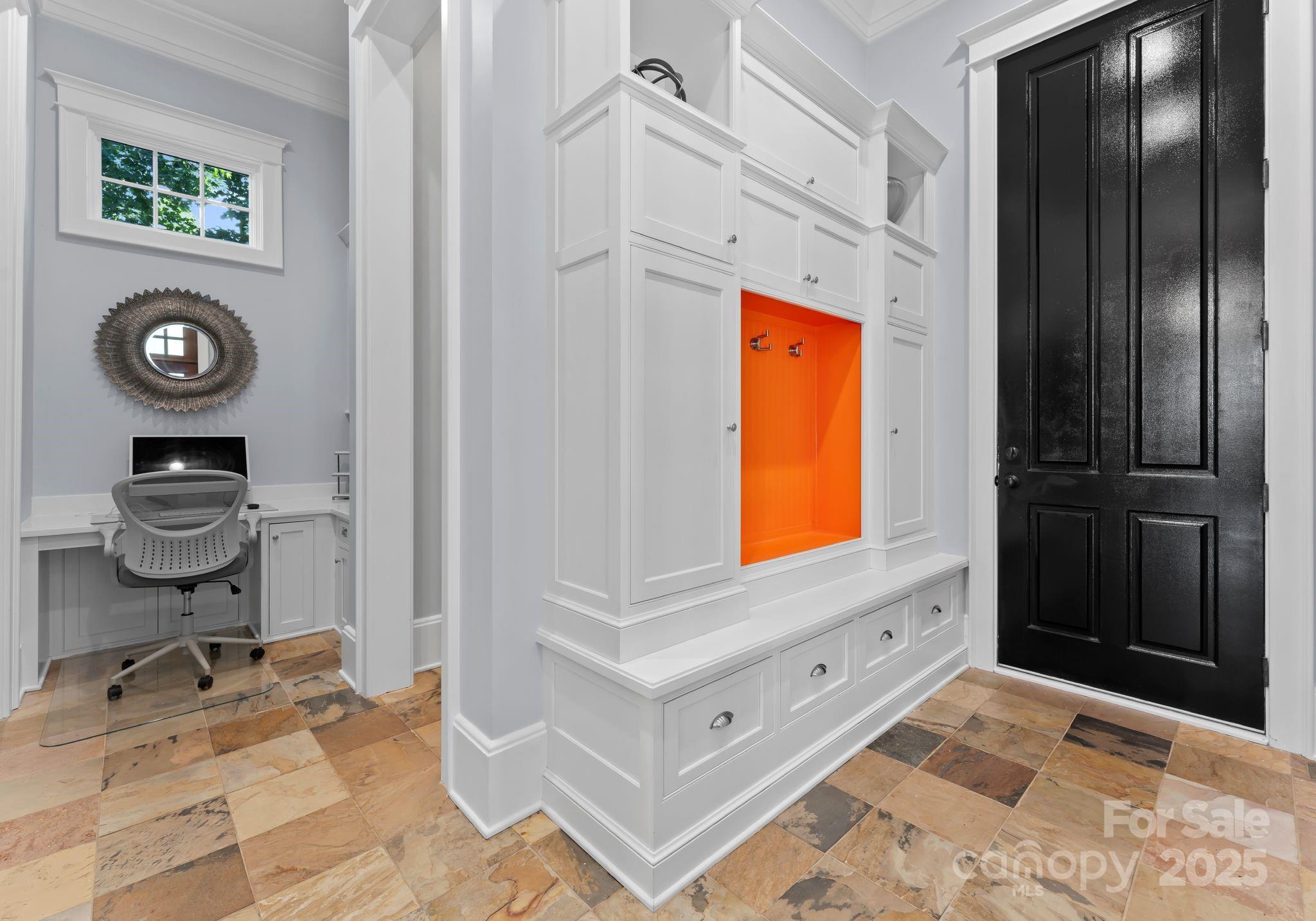 16921 Jetton Road Cornelius, NC 28031 - Photo 37 of 46 a bathroom with a sink a mirror and a shower