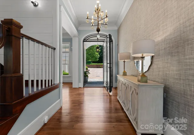a living room with furniture a window and a fireplace