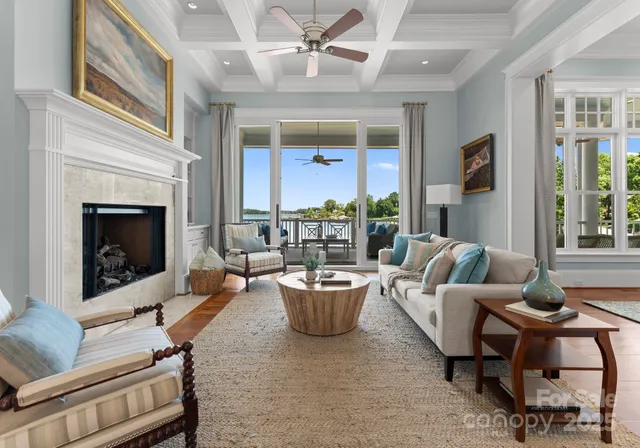 a dining room with furniture window and wooden floor