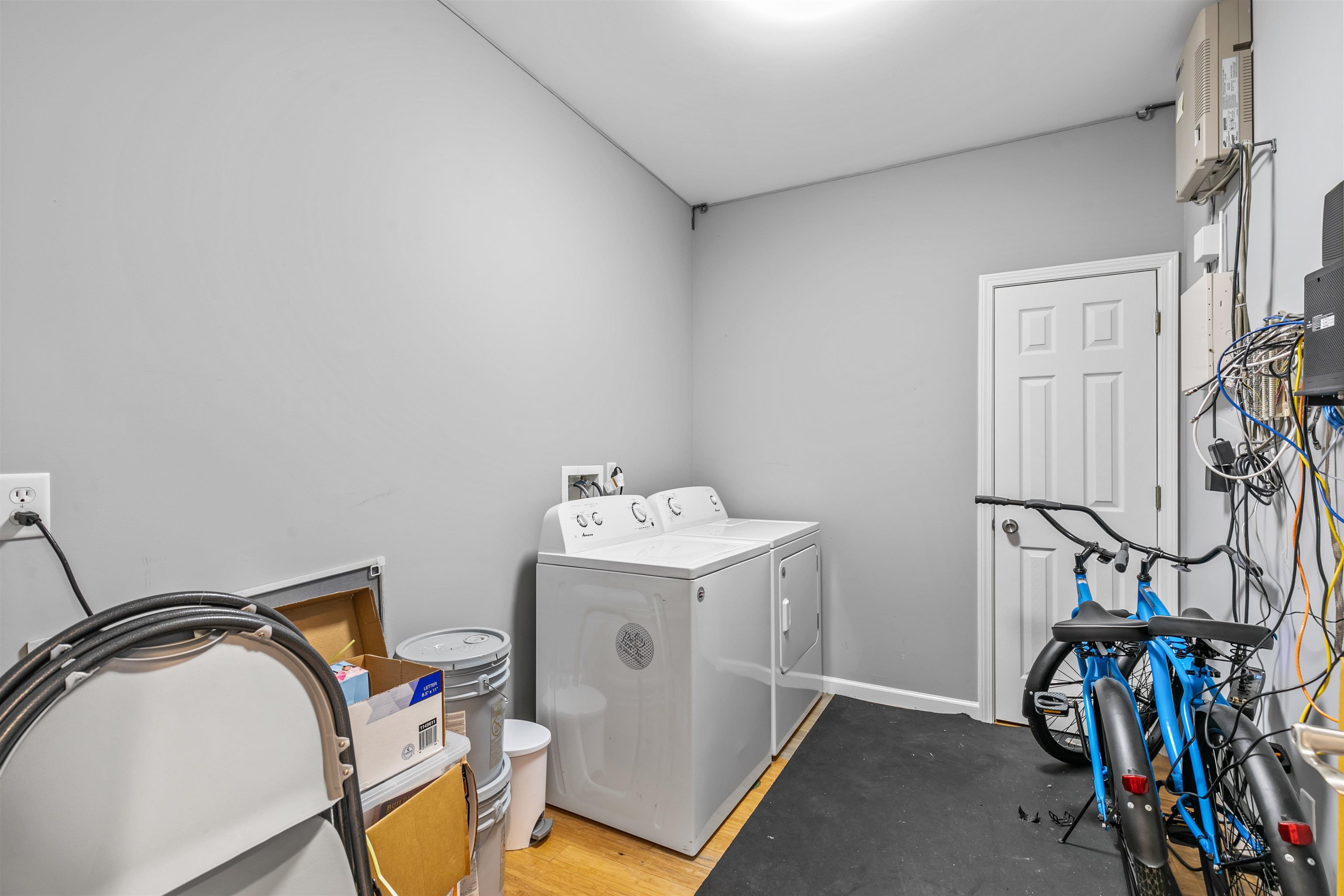28 Spring Street St. Augustine, FL 32084 - Photo 11 of 36 a utility room with dryer and washer