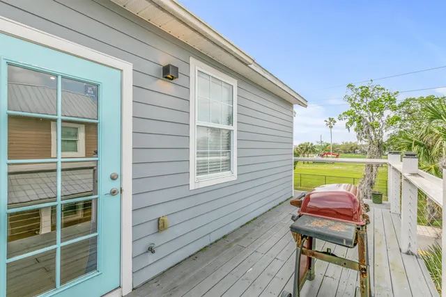 a kitchen with stainless steel appliances granite countertop a refrigerator a stove and a sink with cabinets