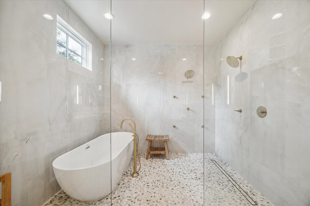 1301 County Road 218 Weimar, TX 78962 - Photo 23 of 55 a bathroom with a bathtub and shower