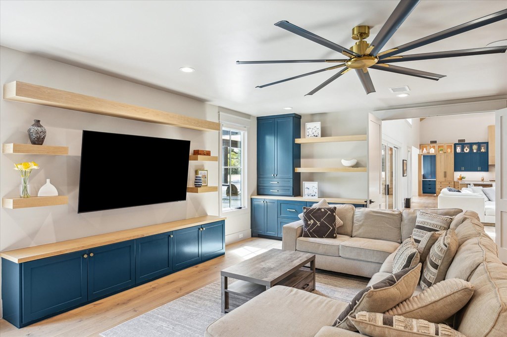 1301 County Road 218 Weimar, TX 78962 - Photo 27 of 55 a living room with furniture and a flat screen tv
