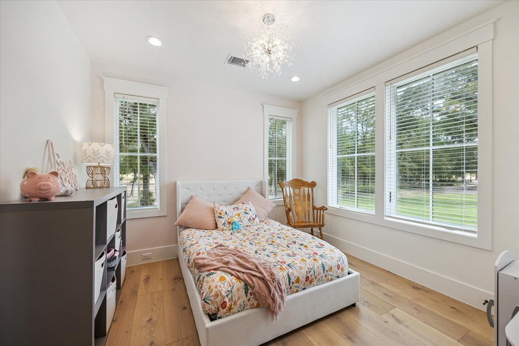 1301 County Road 218 Weimar, TX 78962 - Photo 29 of 55 a bedroom with a large bed and a window