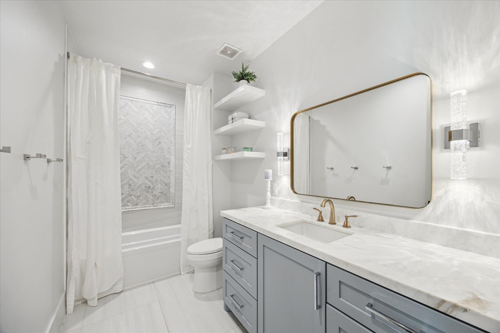 1301 County Road 218 Weimar, TX 78962 - Photo 34 of 55 a bathroom with a sink a toilet and shower