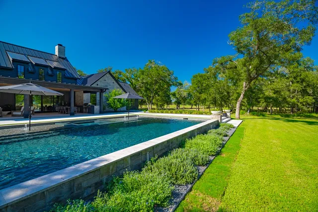 a view of a house with a big yard