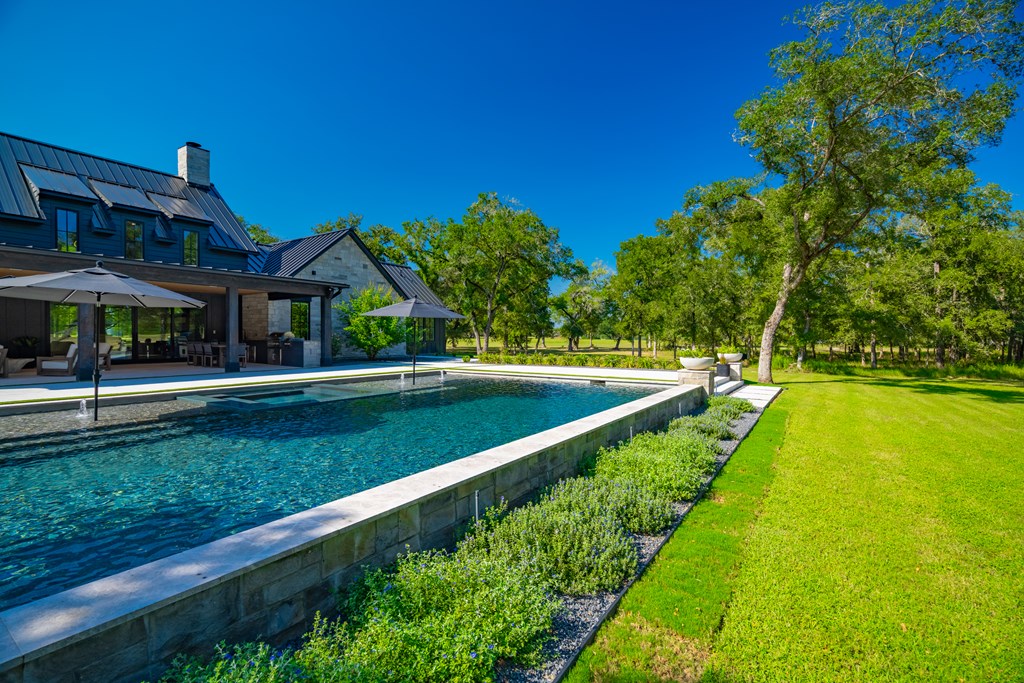 1301 County Road 218 Weimar, TX 78962 - Photo 44 of 55 a view of a house with a yard