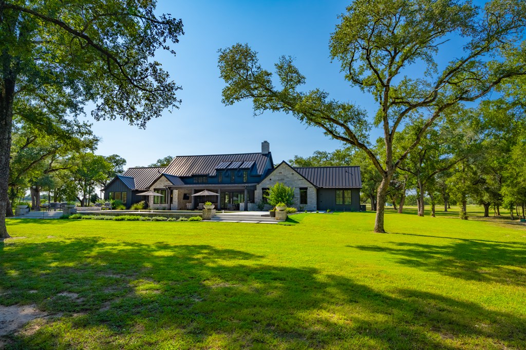1301 County Road 218 Weimar, TX 78962 - Photo 45 of 55 a view of a house with a big yard