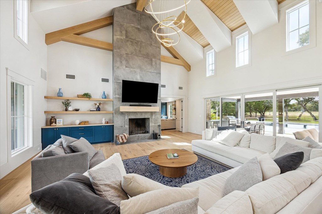 1301 County Road 218 Weimar, TX 78962 - Photo 8 of 55 a living room with furniture and a fireplace