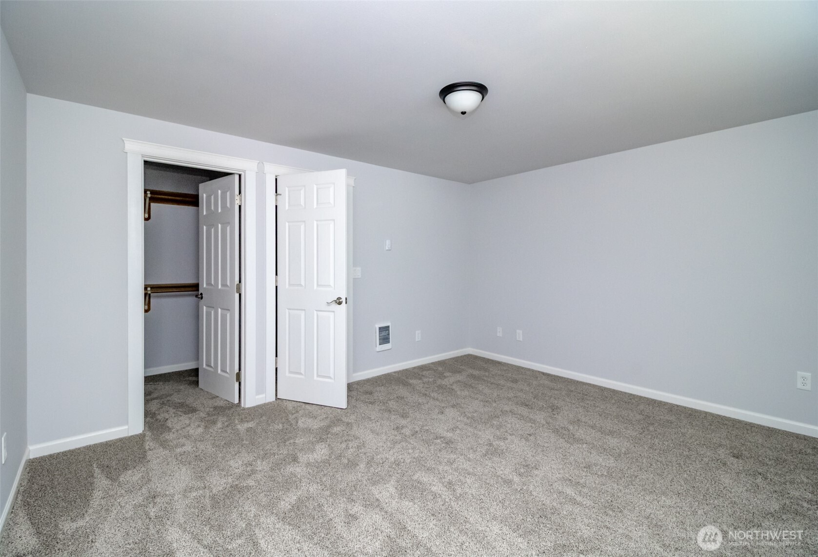5823 186th Ave Court East, Unit A Lake Tapps, WA 98391 - Photo 20 of 27 an empty room with closet area