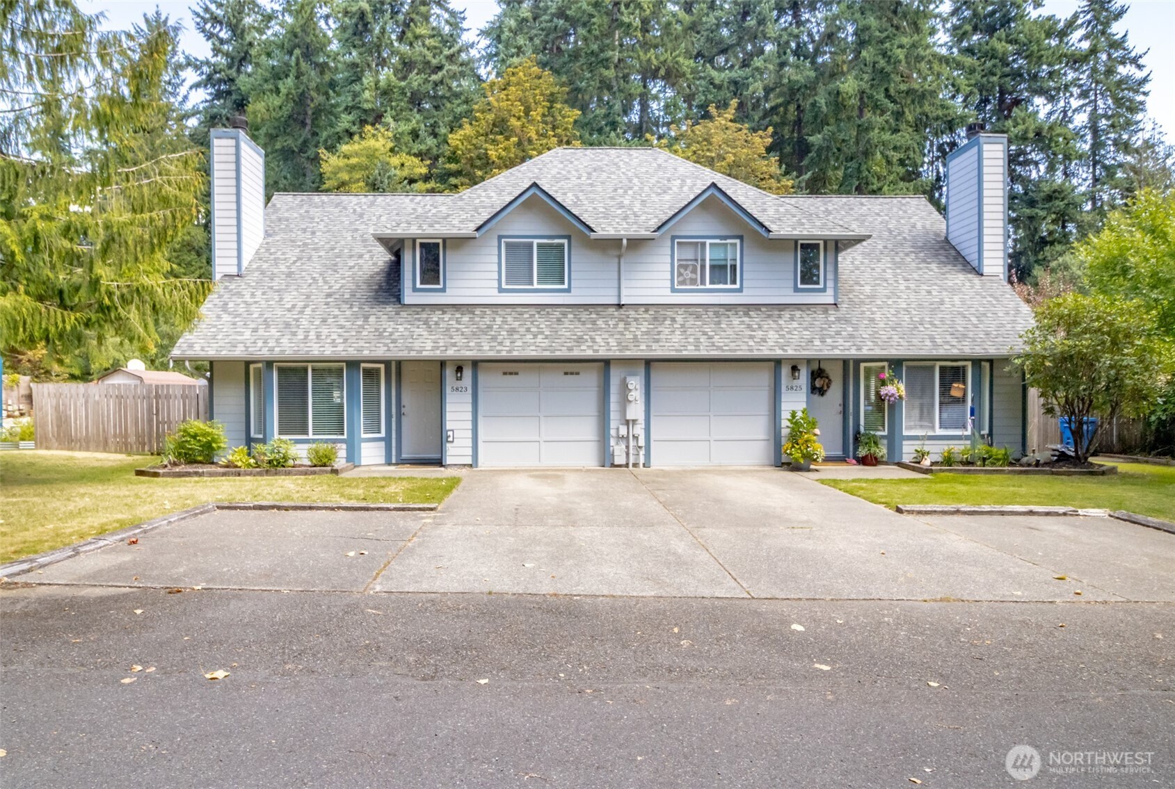 5823 186th Ave Court East, Unit A Lake Tapps, WA 98391 - Photo 2 of 27 a front view of a house with swimming pool