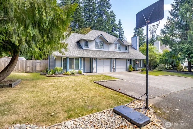 a view of a house with swimming pool and porch