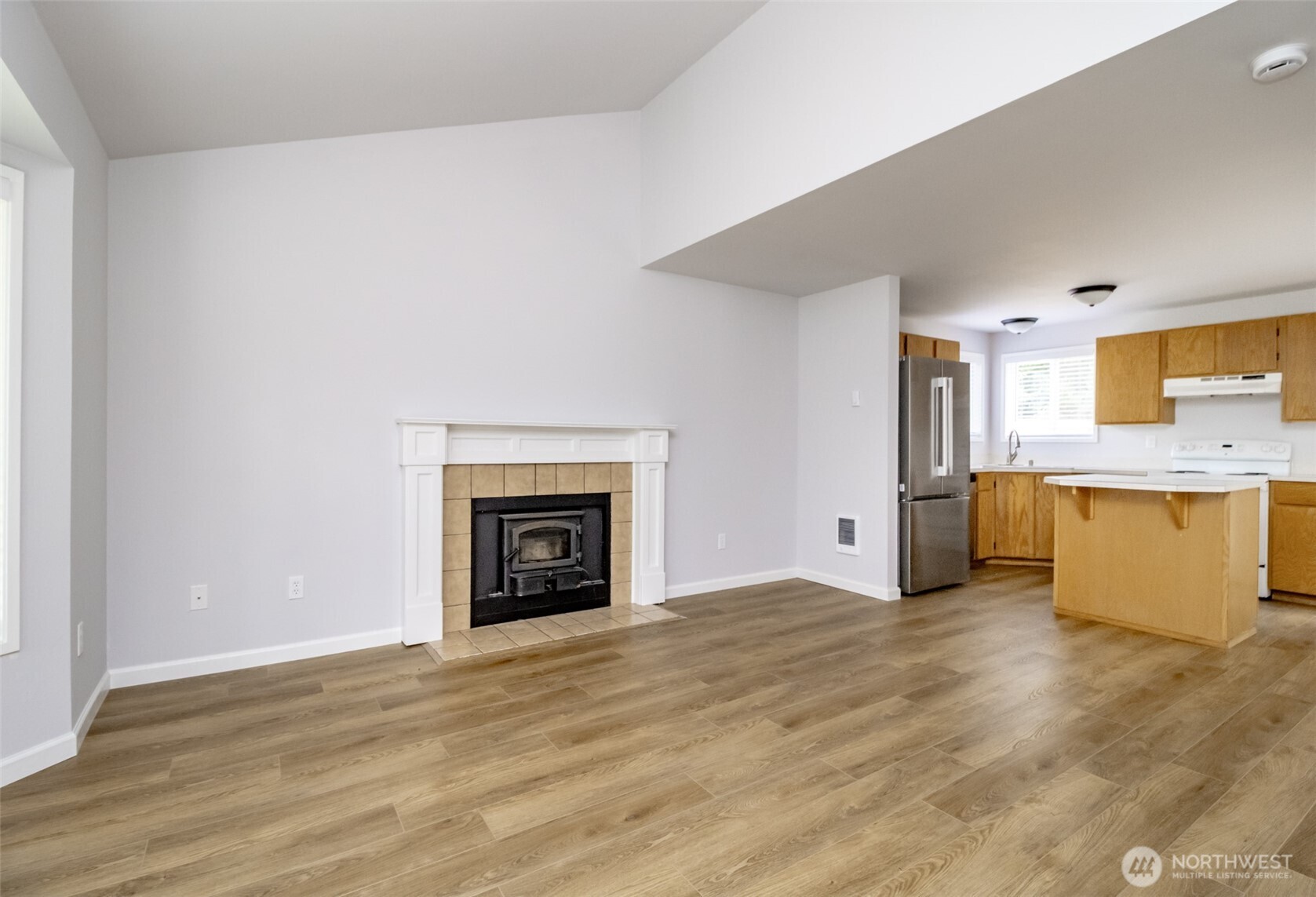 5823 186th Ave Court East, Unit A Lake Tapps, WA 98391 - Photo 5 of 27 a view of a kitchen and a window
