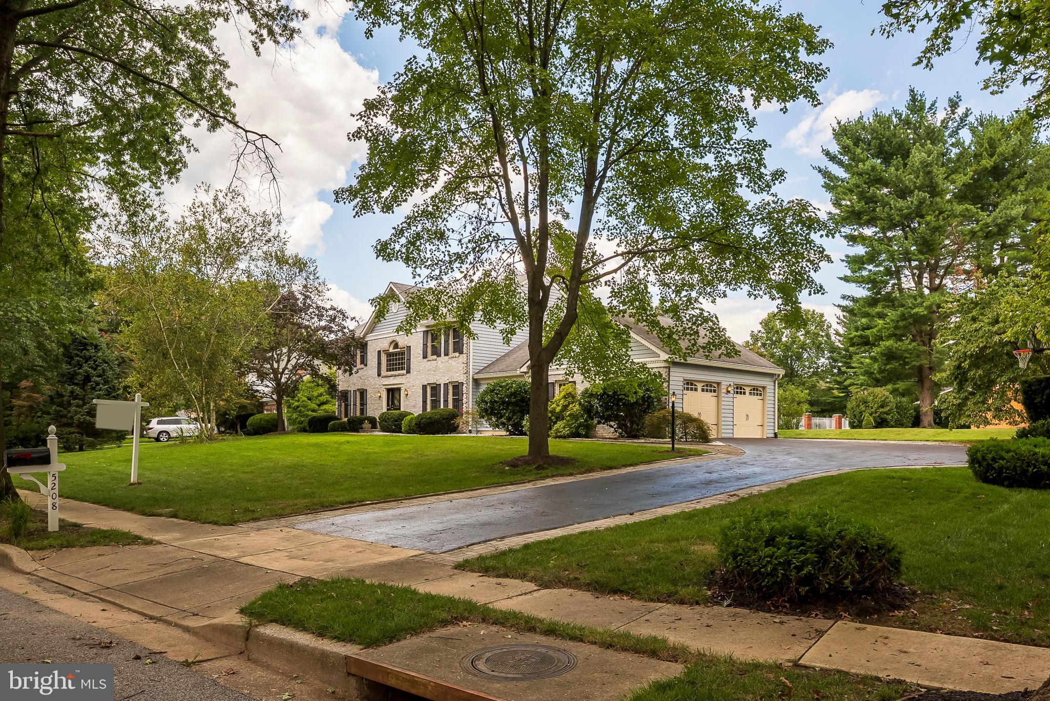 5208 Durham Road East Columbia, MD 21044 - Photo 35 of 36 a front view of a house with a yard and trees