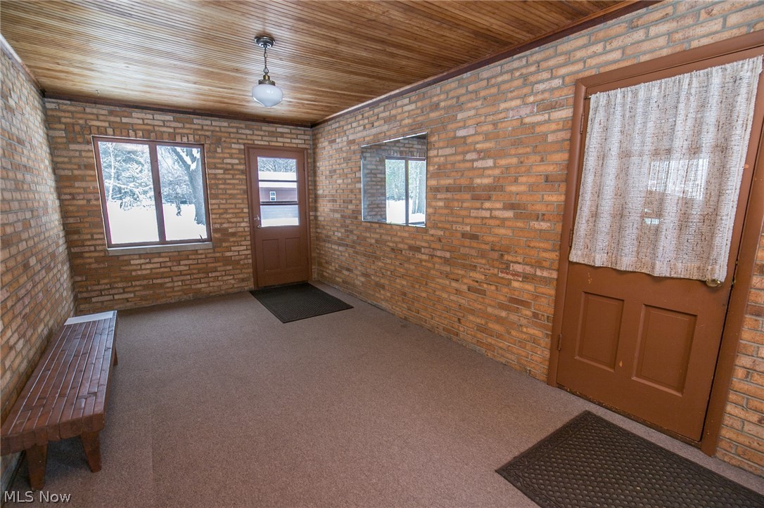 6473 Crossview Road Independence, OH 44131 - Photo 13 of 28 The Breezeway between house and garage is suitable for a myriad of uses: covered entertaining space; craft/hobby room or storage.