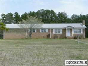 5128 Tabernacle Road Lancaster, SC 29720 - Photo 2 of 8 a view of a house with a yard