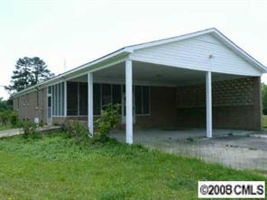 5128 Tabernacle Road Lancaster, SC 29720 - Photo 7 of 8 front view of a house with a yard