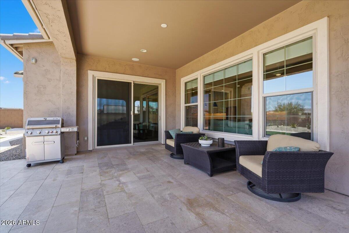 22608 East Stacey Road Queen Creek, AZ 85142 - Photo 53 of 83 a lobby with furniture and floor to ceiling window