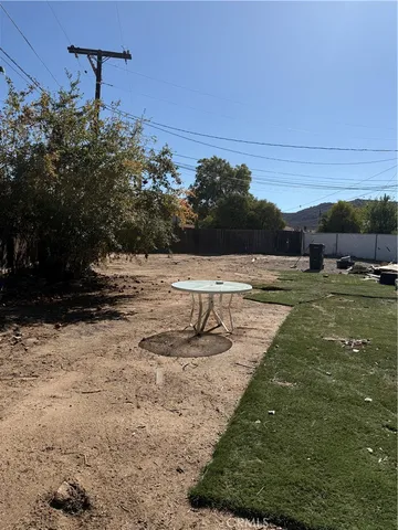 a view of a road with a yard