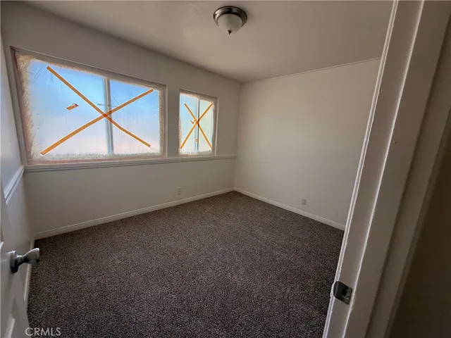 an empty room with a window