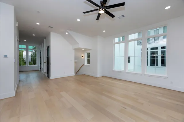 a view of an empty room with a bathroom