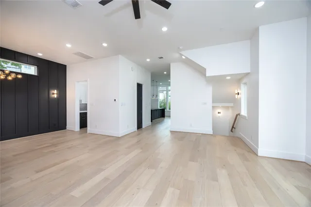 a view of a bathroom with a sink and a mirror