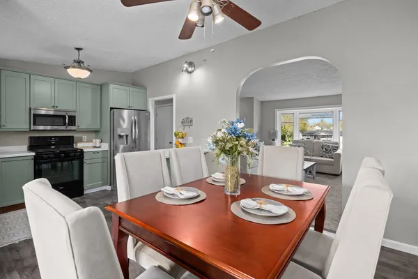 a view of a dining room with furniture