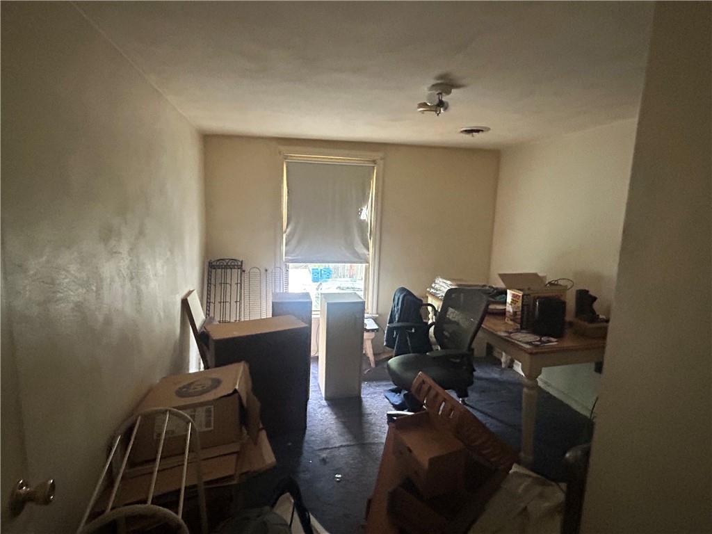 108 Leneake Street Turtle Creek, PA 15145 - Photo 12 of 23 a living room with furniture and wooden floor