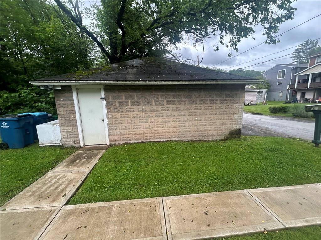 108 Leneake Street Turtle Creek, PA 15145 - Photo 21 of 23 a backyard of a house with lots of green space