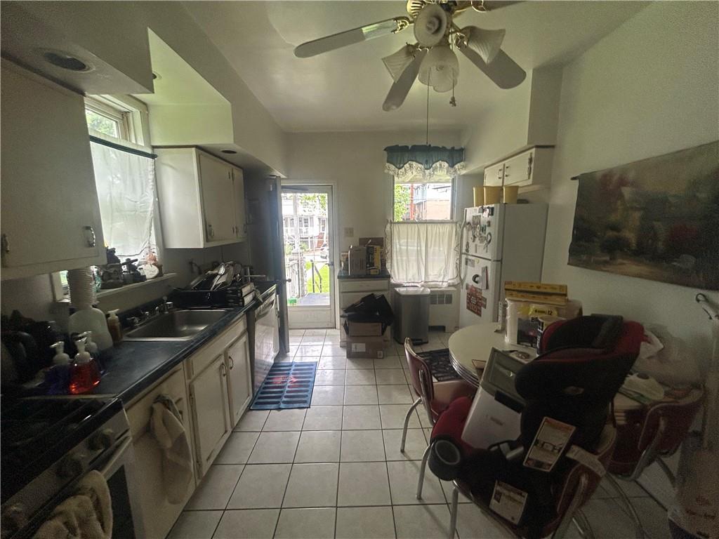 108 Leneake Street Turtle Creek, PA 15145 - Photo 7 of 23 a lobby with furniture and flat screen tv