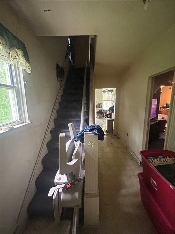108 Leneake Street Turtle Creek, PA 15145 - Photo 8 of 23 a living room with furniture and a flat screen tv