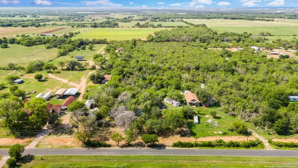 a view of a yard with an outdoor space