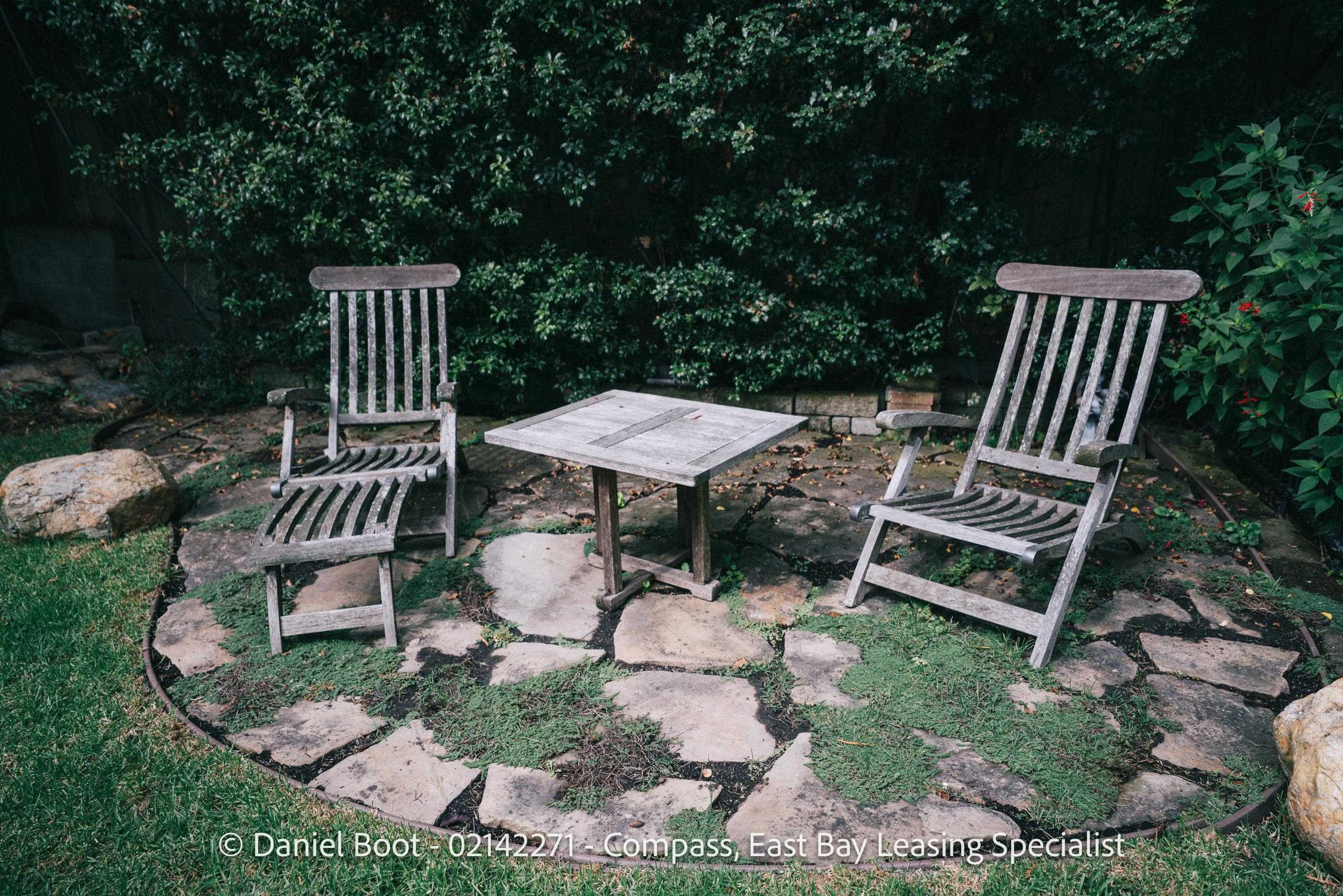 2141 Ward Street Berkeley, CA 94705 - Photo 12 of 41 a view of a chairs and table in backyard