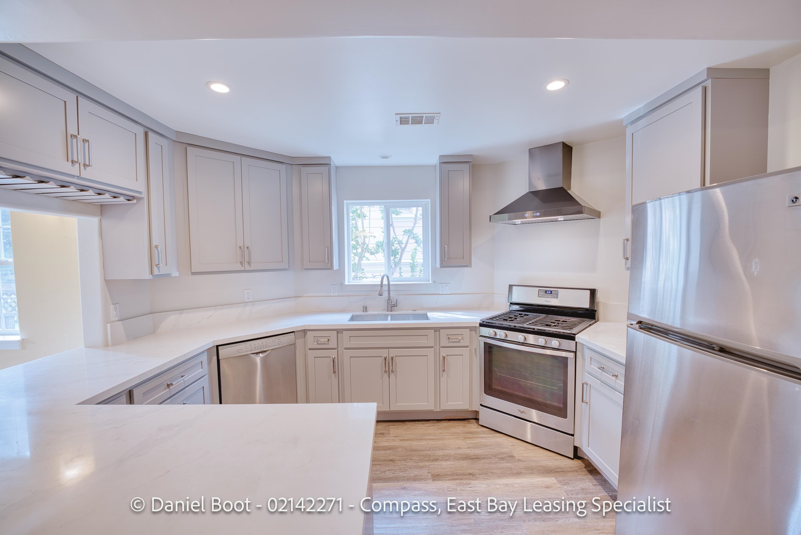 2141 Ward Street Berkeley, CA 94705 - Photo 28 of 41 a kitchen with stainless steel appliances granite countertop a sink stove and refrigerator