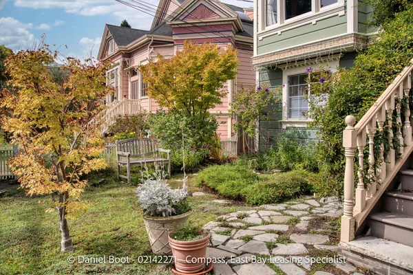 a view of a back yard of the house