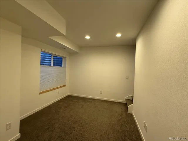 an empty room with a natural light