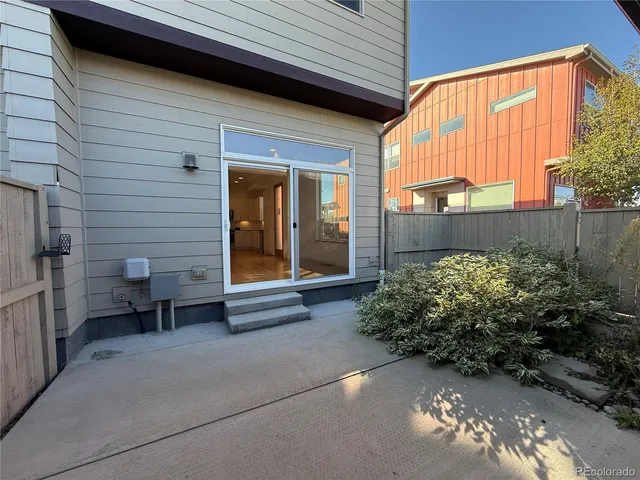 a view of a backyard with garden