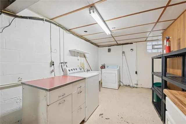 a utility room with cabinets