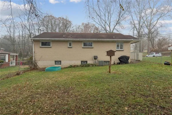an aerial view of a house with a garden