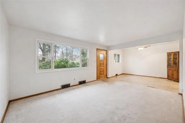 an empty room with windows