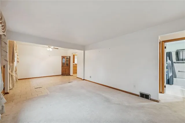 an empty room with window