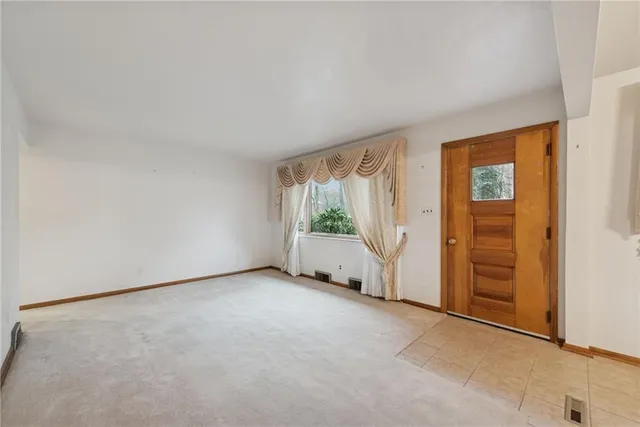 an empty room with windows