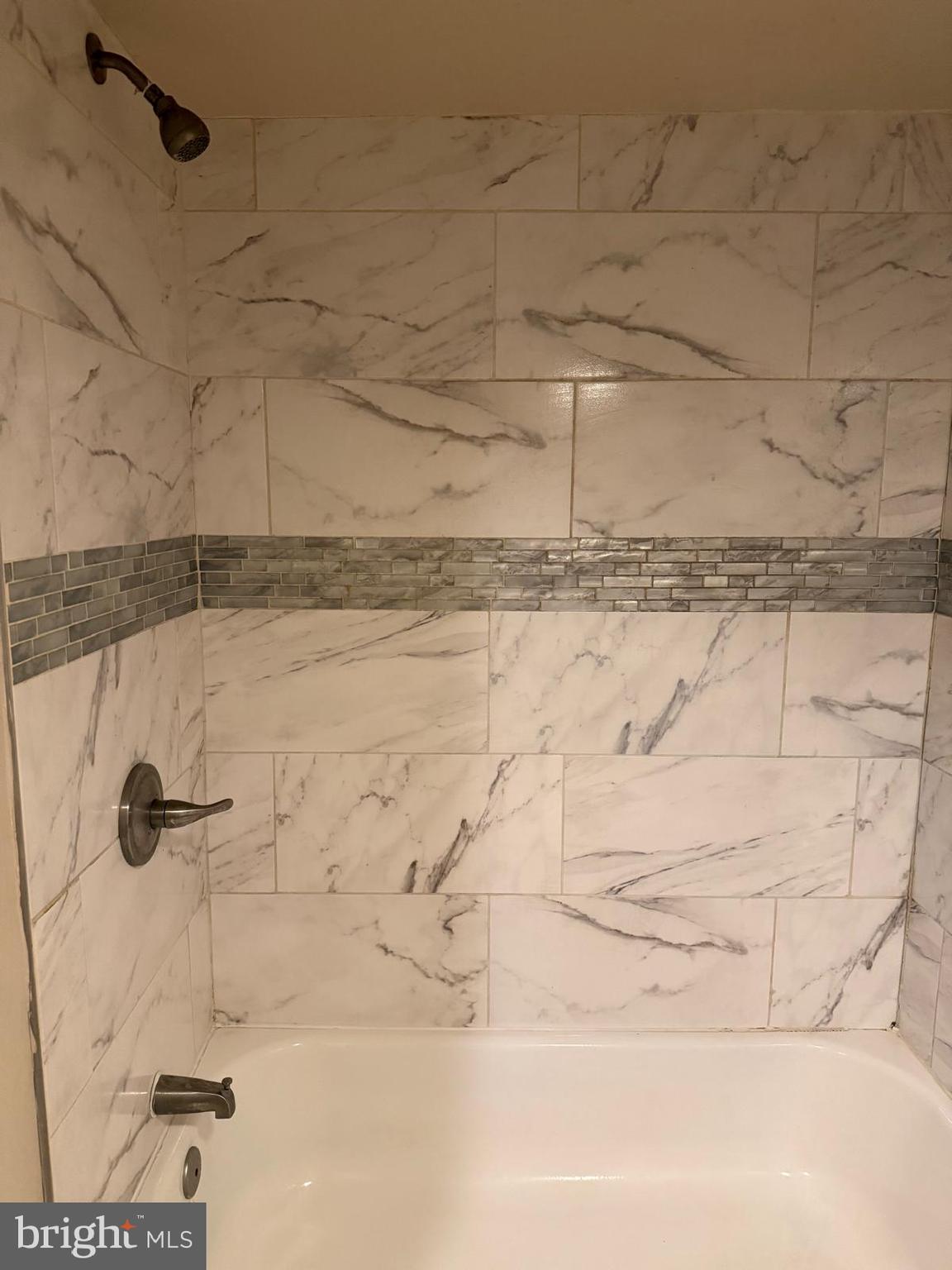 415 Grovethorn Road Baltimore, MD 21220 - Photo 13 of 16 a bathroom with a shower