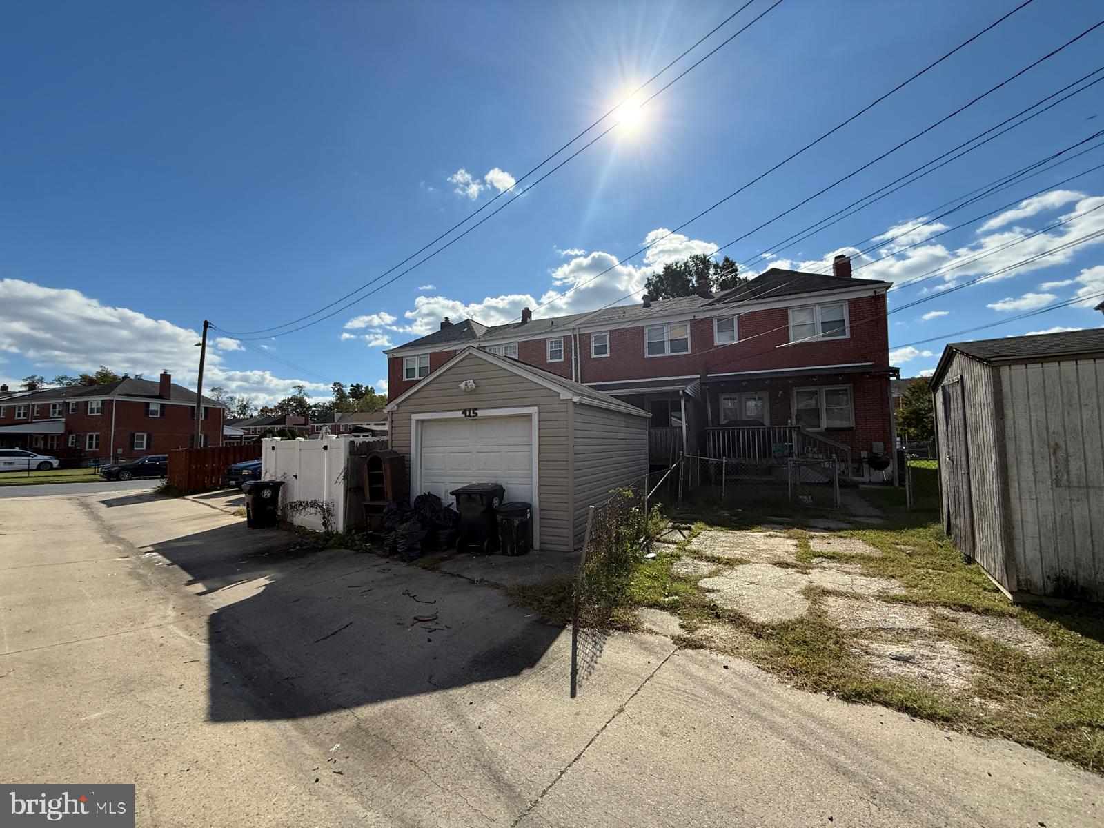 415 Grovethorn Road Baltimore, MD 21220 - Photo 16 of 16 a view of a house with a snow in the yard